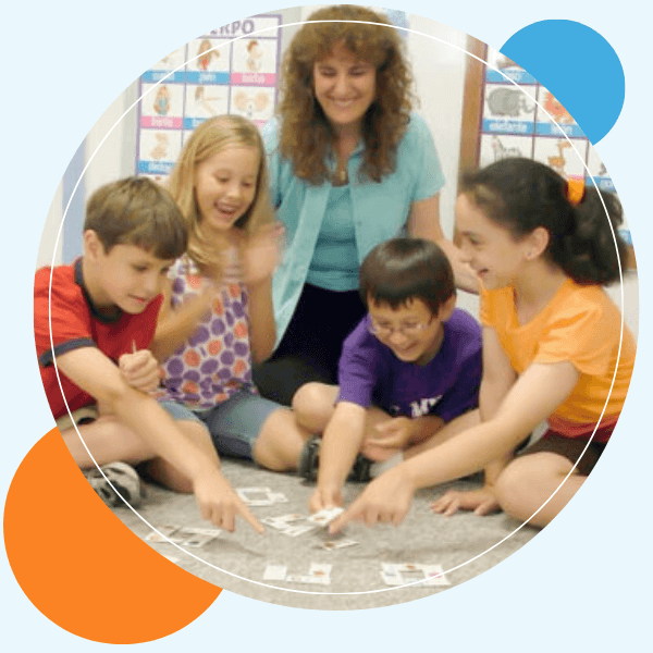 a teacher helping kids learn spanish
